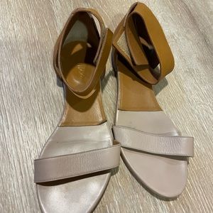 Slightly worn ankle strap sandles